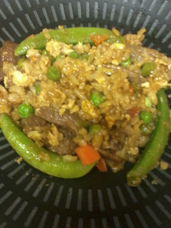 A picture of steak fried rice.