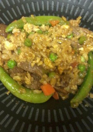A picture of steak fried rice.