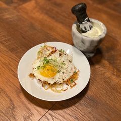 A picture of Egg Nest with Magic Sauce.