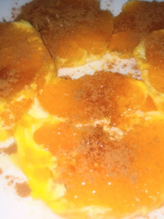 Una foto de Naranja con azúcar y canela