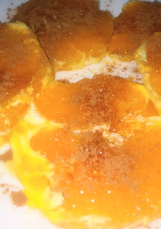 Una foto de Naranja con azúcar y canela