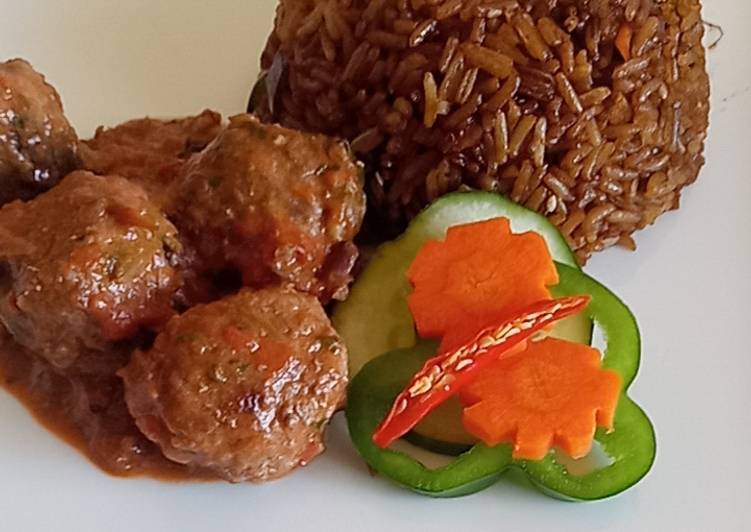 Meat balls in tomato Concasee' with stir fried rice