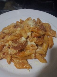 Una foto de Pasta marinara y parmesano
