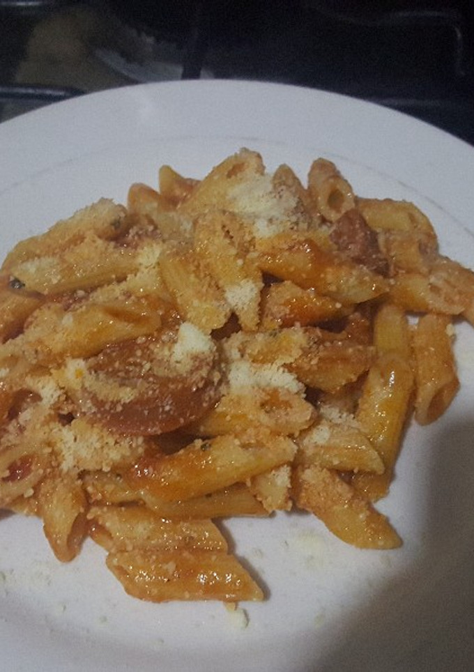 Una foto de Pasta marinara y parmesano