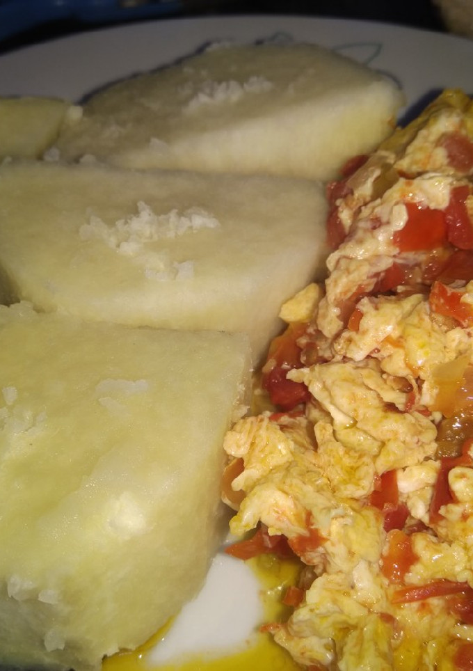 A picture of Boiled yam and scrambled egg.