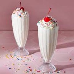 A picture of Enhancing vanilla milkshake🍒🍒🍒.