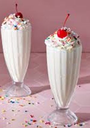 A picture of Enhancing vanilla milkshake🍒🍒🍒.