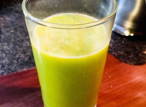 Foto de Suco verde de laranja tangerina e couve