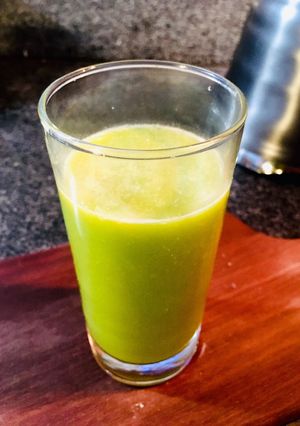Foto de Suco verde de laranja tangerina e couve