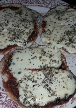 Una foto de Pizzetas en pan de hamburguesa