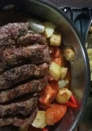 Una foto de Carne al horno con papas