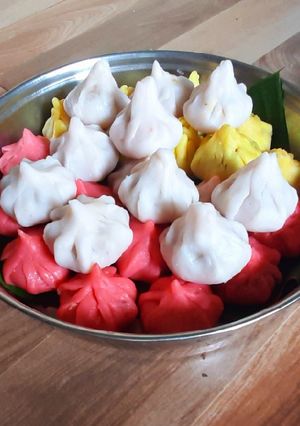 A picture of Colourful modak Happiness overloaded.