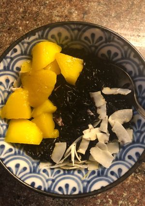 A picture of Indonesian-style Coconut Black Rice Pudding with Mango - vegan.
