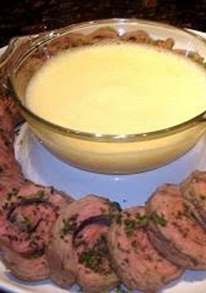 A picture of Poached Beef Topside Steak Pinwheels with Sabayon Sauce.