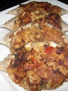 A picture of Crab Omellete Stuffed in Shell.