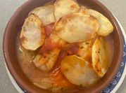 Una foto de abadejo con pimientos