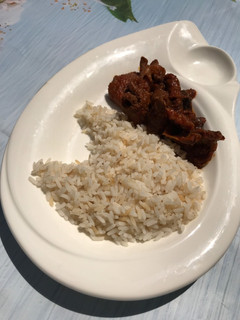 A picture of Rice with sauce.