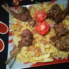 A picture of Muton Chops With Golden Rice.