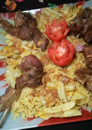 A picture of Muton Chops With Golden Rice.