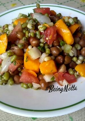 A picture of Seasonal Fruits & Sprouts Salad.