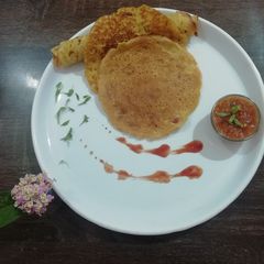 A picture of Gram flour pancakes (besan chilla / flat bites).