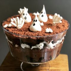 A picture of Graveyard Trifle with Meringue Ghost Cookies.