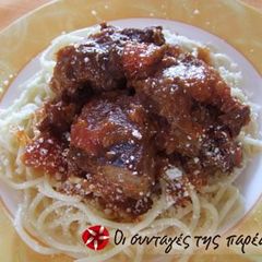 A picture of Veal with tomato sauce.