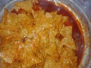 Una foto de chilaquiles roja