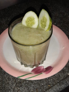 A picture of Cucumber & apple smoothie with coconut cream.