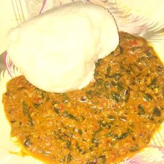 A picture of Tuwo with moringa soup.