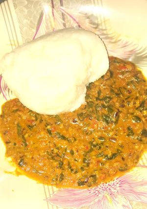 A picture of Tuwo with moringa soup.