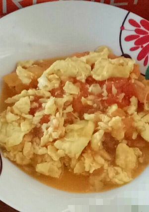 A picture of Egg and tomato.