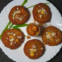 A picture of Pizza Cutlet Indian cutlet with Italian cheesy filling.