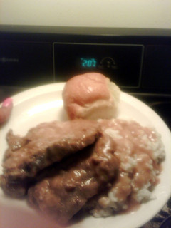 A picture of smothered pork chops.