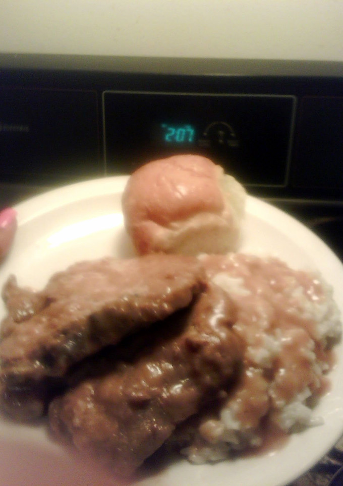A picture of smothered pork chops.