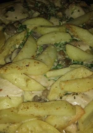 Una foto de Pechuga al verdeo con papas y champignones