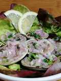 Almejas en salsa morada