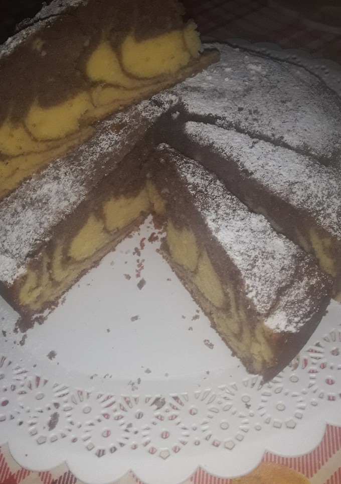 Una foto de Torta marmolada 😋