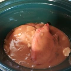 A picture of Crock pot pork chops and gravy.