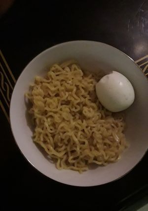 A picture of Indomie mixed with egg.