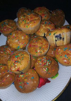 A picture of Blueberry cupcakes with vermicelli.