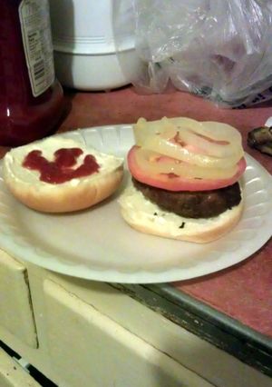 A picture of cheese stuffed hamburgers.