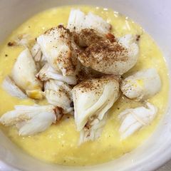 Egg rice porridge with lump crab meat A picture of Egg rice porridge with lump crab meat.