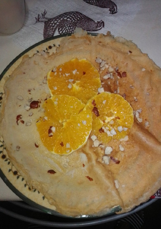 Una foto de Crepes de naranja, avellanas y miel