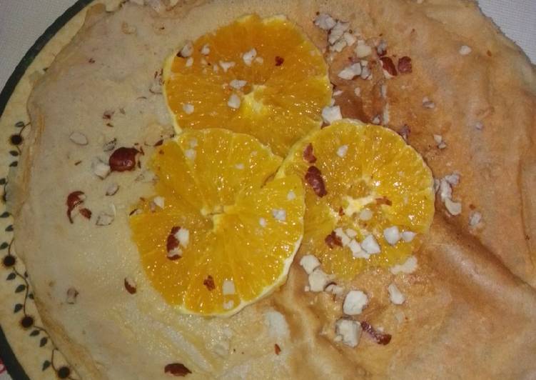 Crepes de naranja, avellanas y miel