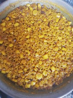 Una foto de Arroz a banda