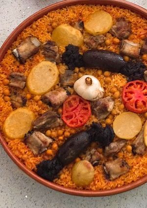 Una foto de Arroz al horno, 100% domingo
