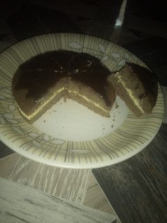 A picture of Chocolate cake with melted chocolate.