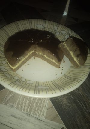 A picture of Chocolate cake with melted chocolate.