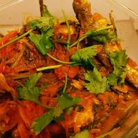 Dhaney tangra (tangra fish cooked with coriander powder)